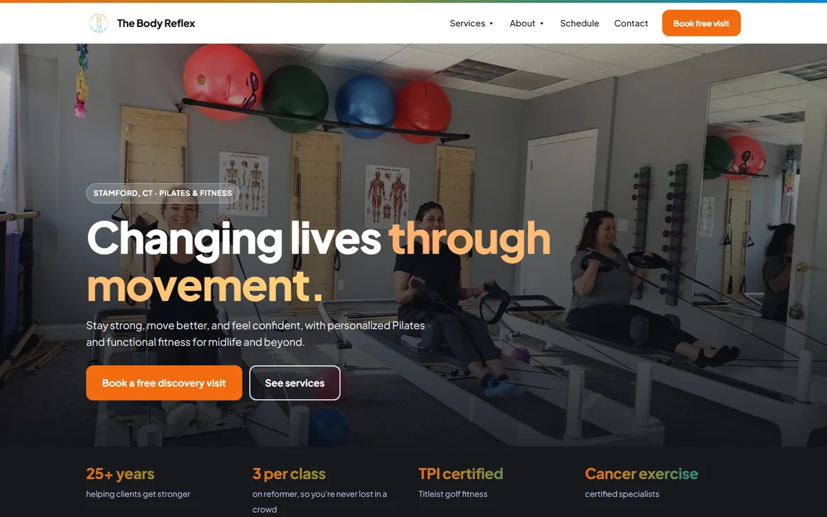 The rebuilt homepage: a full-width studio photo, the headline Changing lives through movement, and one button to book a free visit.